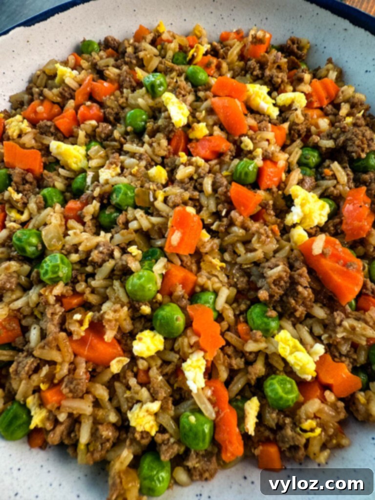 A close-up of the ground beef fried rice, showcasing the mixture of beef, rice, and vegetables.
