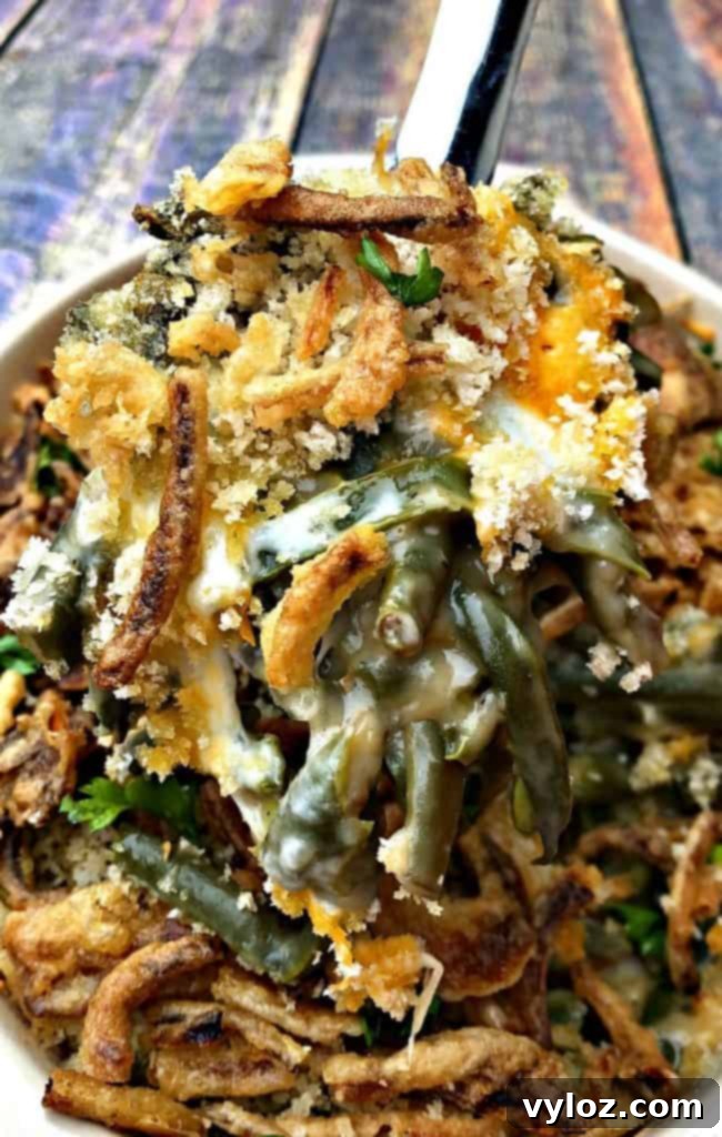 Instant Pot with green beans simmering in a creamy, cheesy sauce.