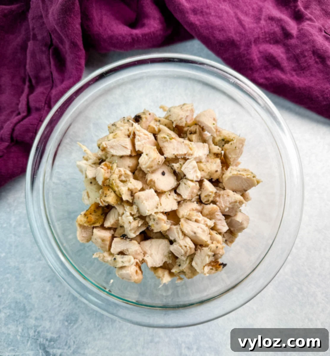 diced grilled chicken in a glass bowl