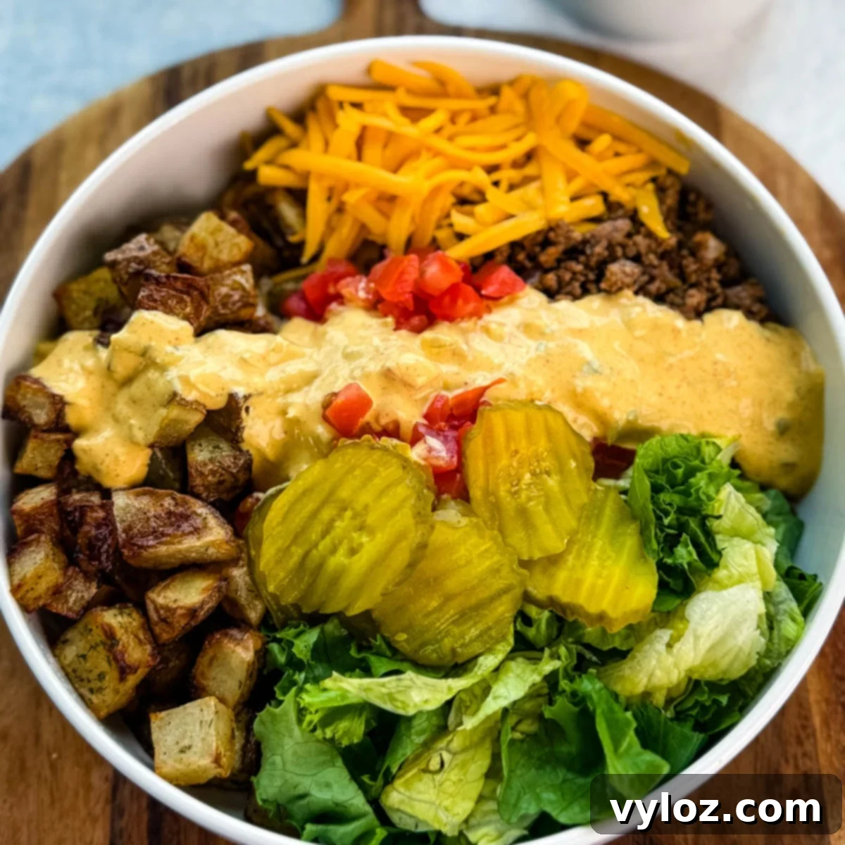Snatched Summer Body Meal Plan 37 High-protein Big Mac Bowl with Crispy Potatoes, a healthy takeout alternative