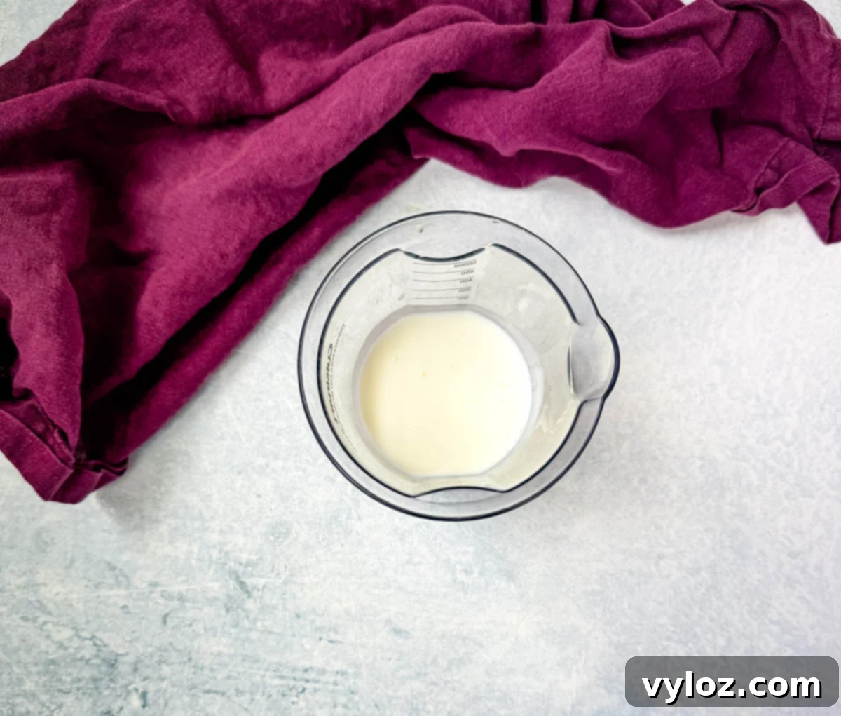 buttermilk in a white measuring cup