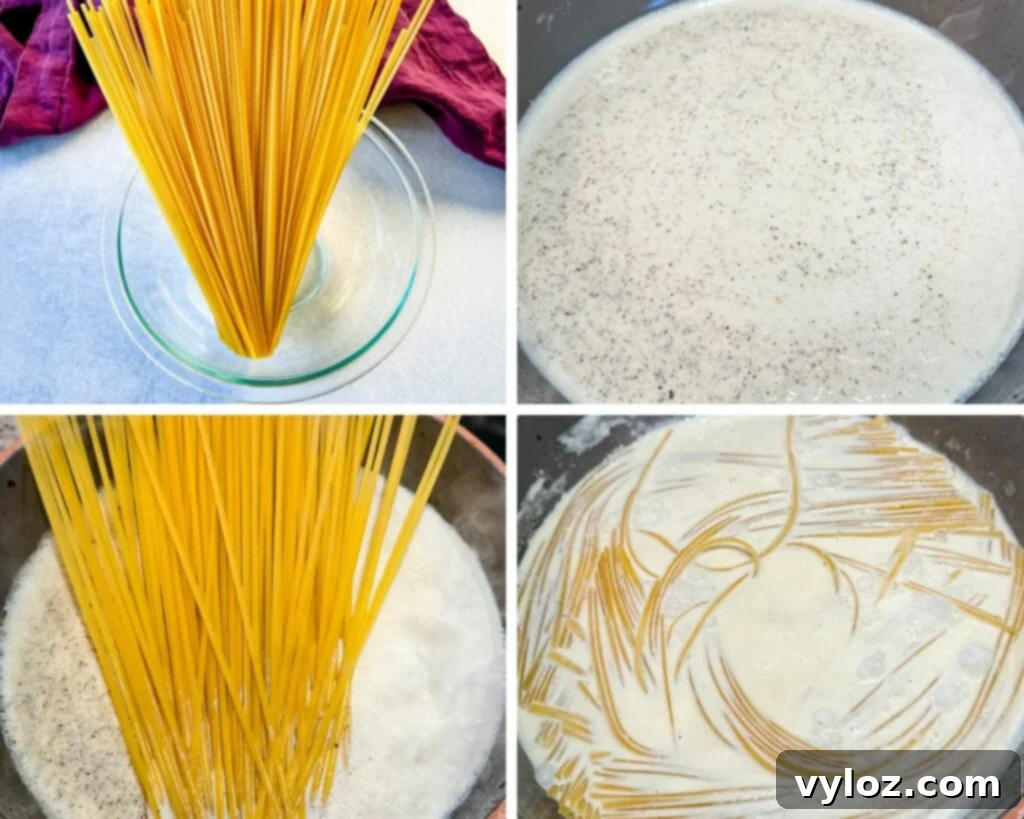 Hearty Ground Beef Alfredo 6 Long strands of linguine being gently submerged into a creamy Alfredo sauce in a wide pan, ready to absorb flavors.