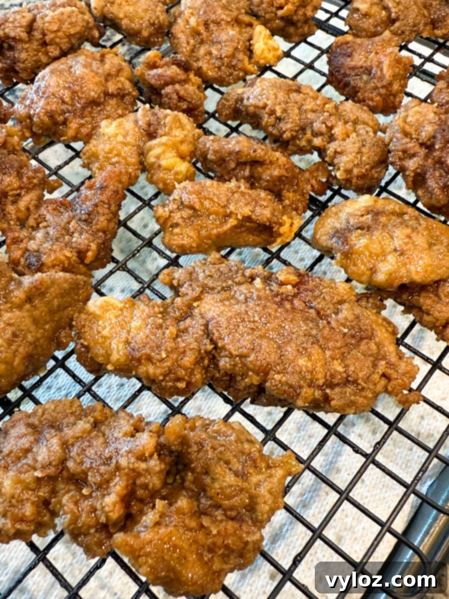 Crispy Fried Chicken Livers 9 Crispy fried chicken livers resting on a wire rack to drain excess oil.