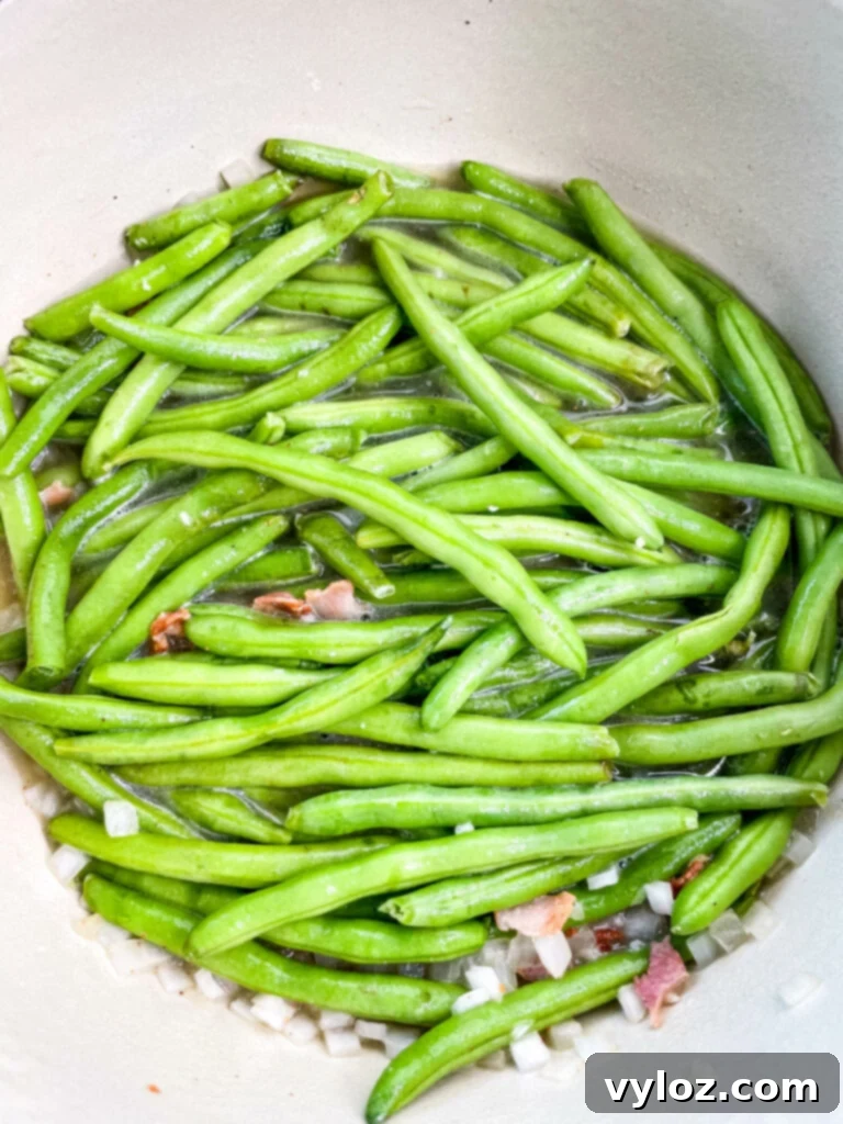 uncooked Southern green beans in a pot