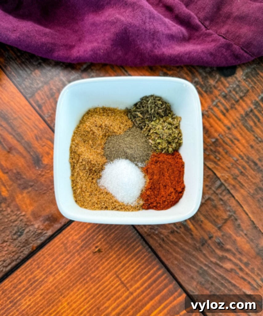 Spicy Cajun Turkey 4 homemade Cajun rub spices in a white bowl