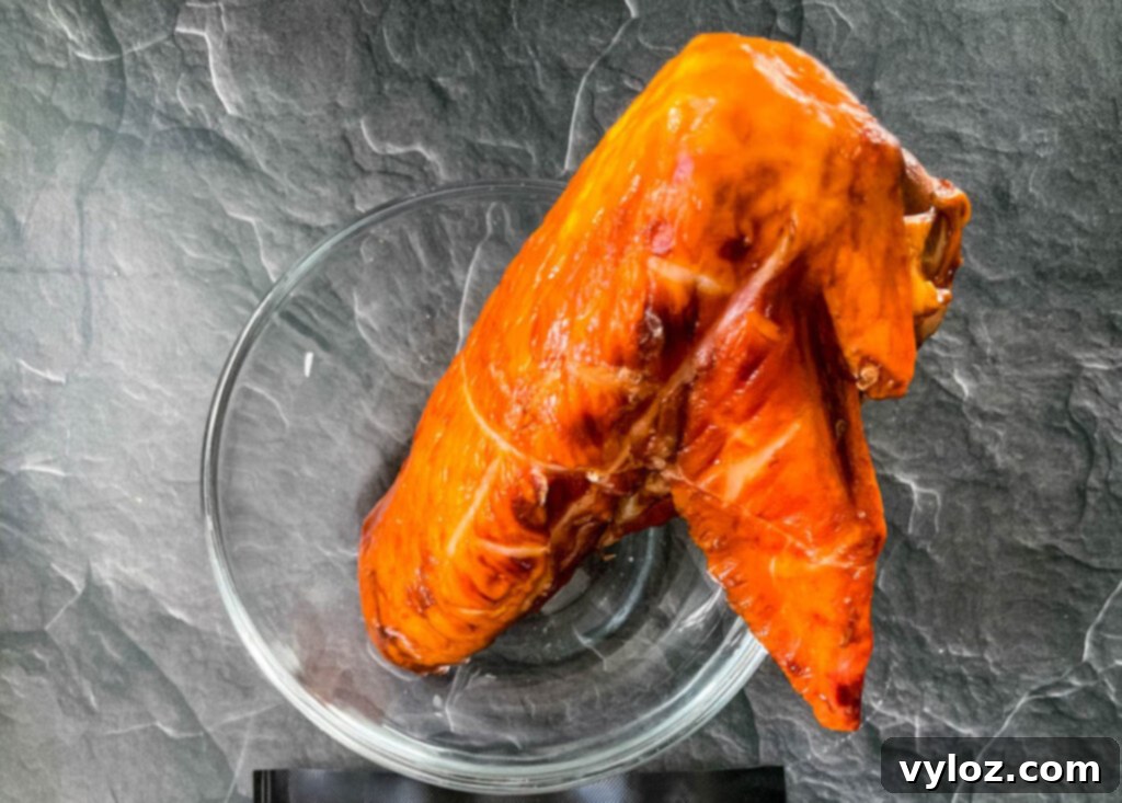 Collard greens being washed in a large bowl
