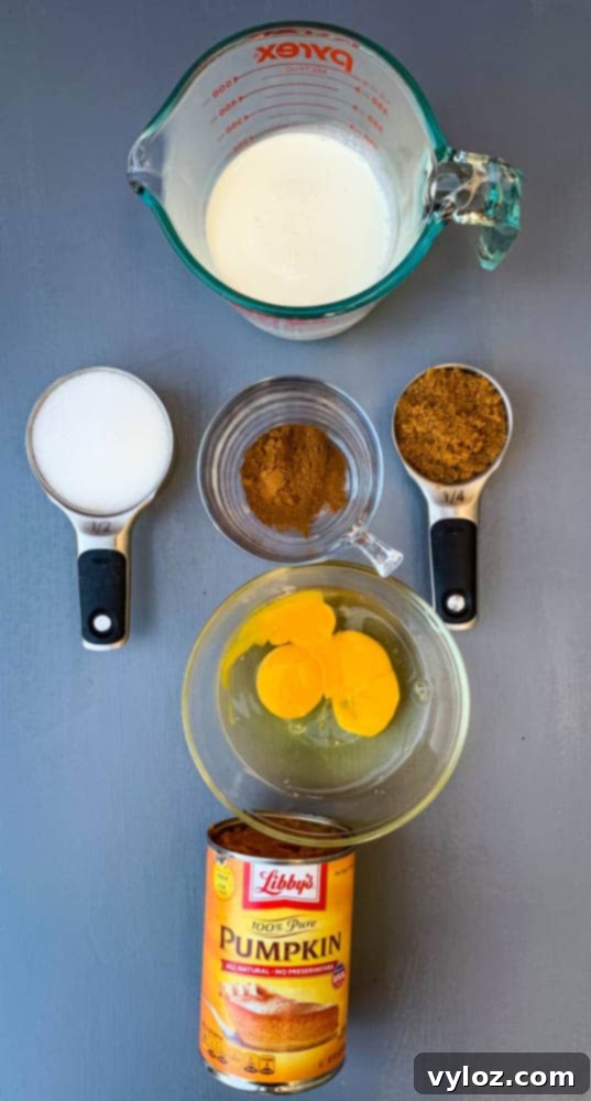 Naturally Sweetened Pumpkin Pie 4 sweetener, eggs, pumpkin puree, and pumpkin pie spice in glass bowls