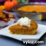 Naturally Sweetened Pumpkin Pie 9 sugar free pumpkin pie pie on a plate with whipped cream