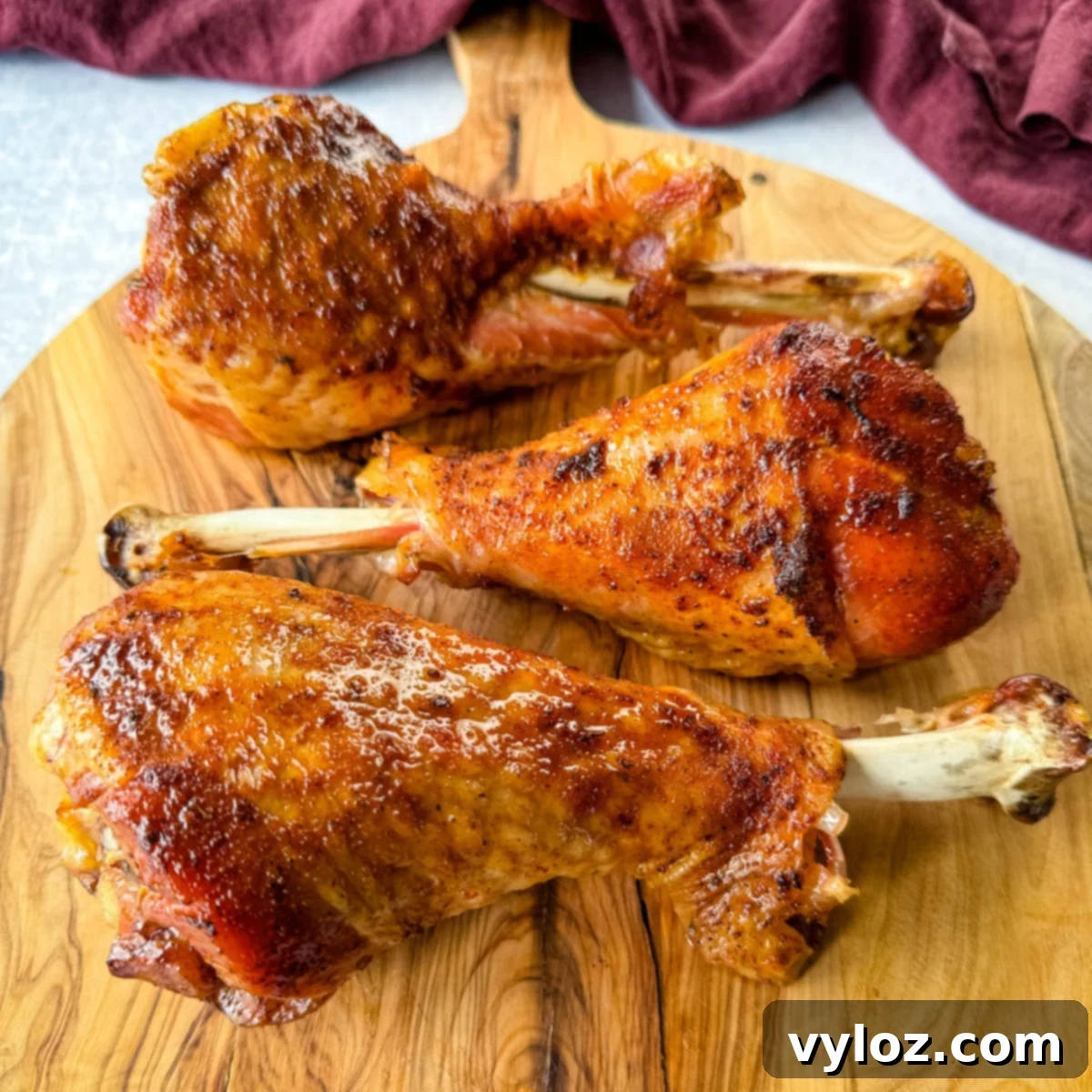Smoked turkey legs served on a plate, ready to be enjoyed