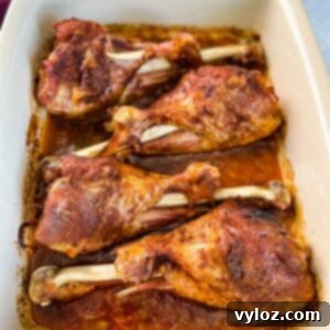 baked turkey legs in a baking dish