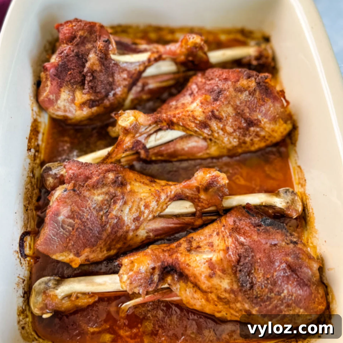 baked turkey legs in a baking dish