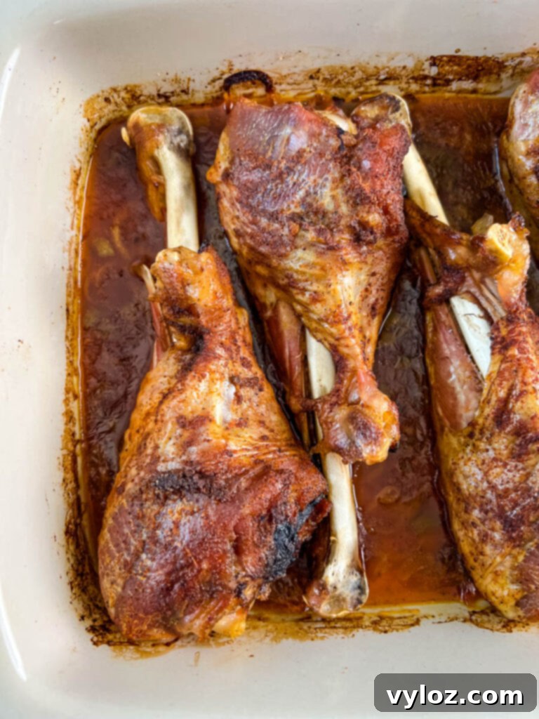 baked turkey legs in a baking dish