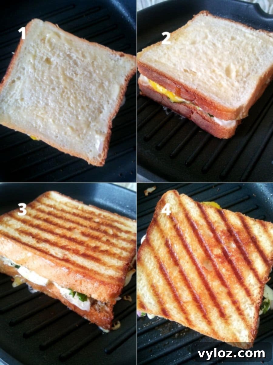 Quick Sliced Boiled Egg Sandwich 4 Grilling a Boiled Egg Sandwich on a pan, showing golden crust