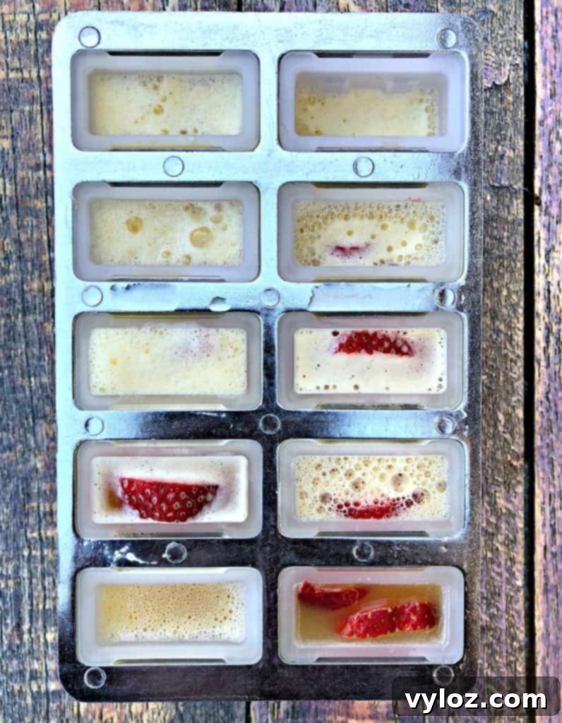 Adult Margarita Pops 5 Margarita mixture being poured into a popsicle mold