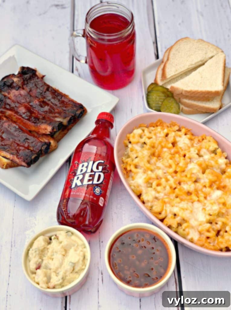 mac and cheese, red soda, with various side dishes ready for a Kansas City BBQ meal