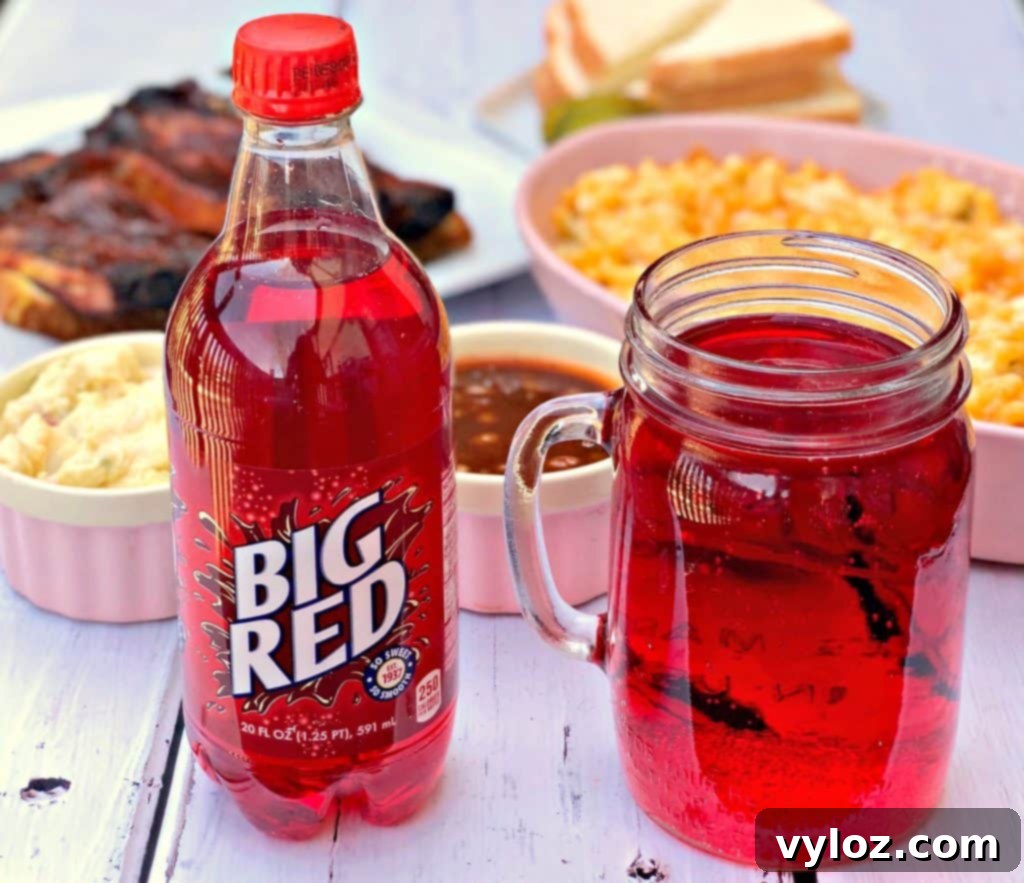 baked mac and cheese, alongside Big Red soda and other BBQ side dishes