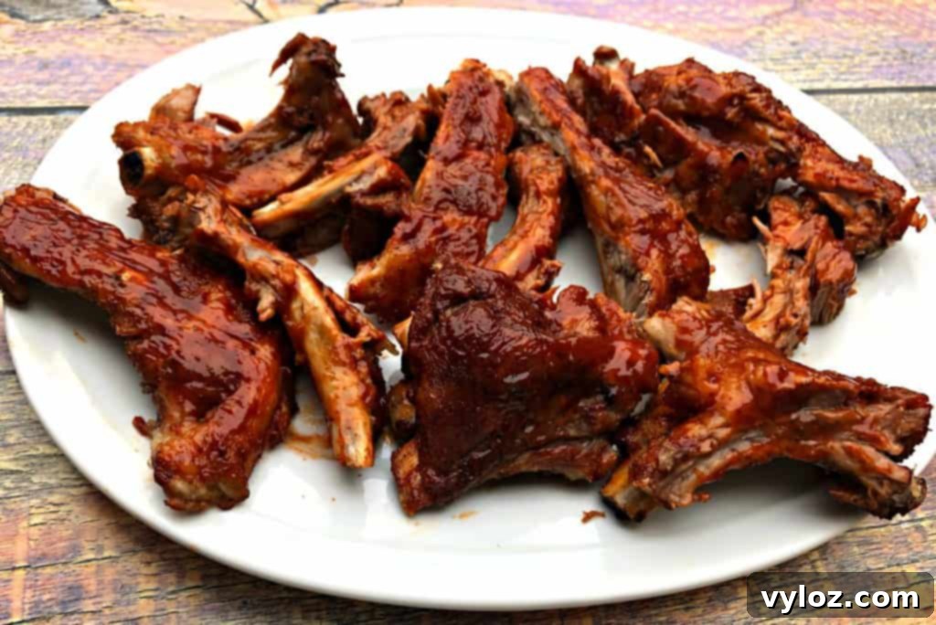 instant pot baby back ribs on a white plate, close-up