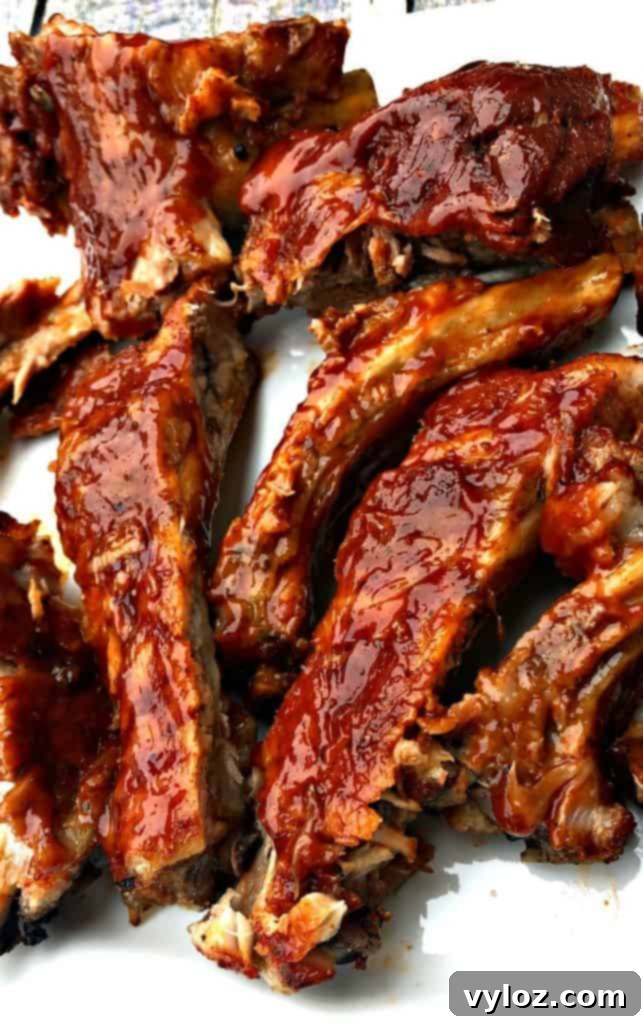 instant pot baby back ribs on a white plate, ready for plating