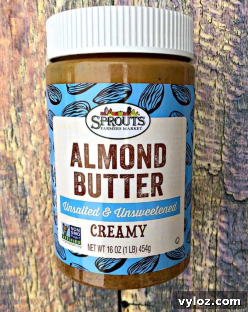 Jar of unsweetened almond butter, a key ingredient for richness