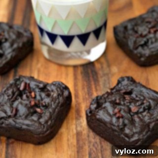 avocado brownies with milk on a brown cutting board