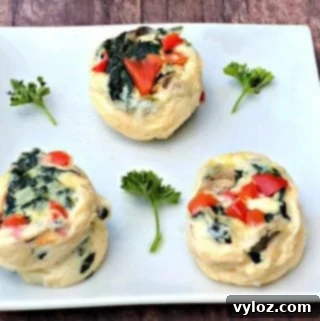 Keto Veggie Egg White Bites 11 Keto Low-Carb Egg White Omelet Vegetable Bites on a white plate