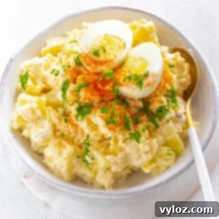 Effortless Instant Pot Potato Salad 8 instant pot potato salad with boiled eggs in a pink bowl