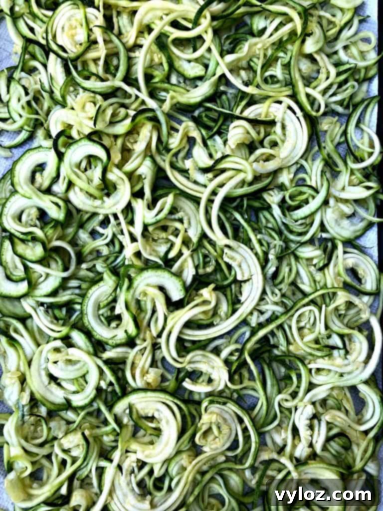 spriralized zucchini on a sheet pan