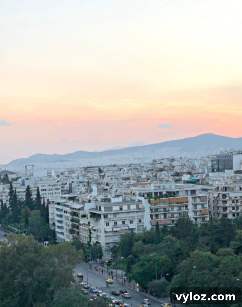 Panoramic night view of Athens from a rooftop bar