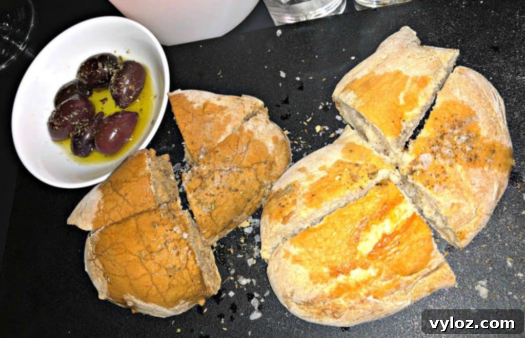 Chef grilling fresh fish at a table in a restaurant