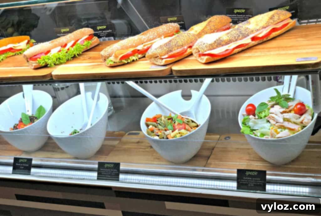 Fresh salads served in white bowls at Spezie Restaurant