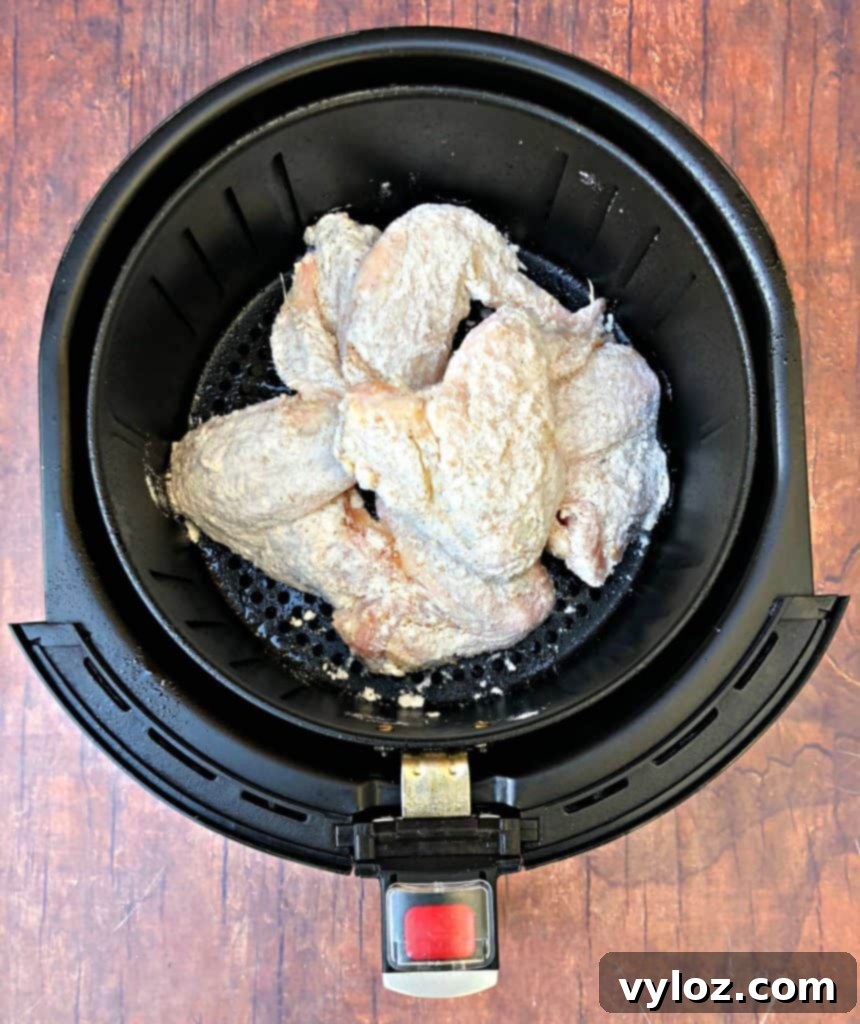 Crispy Air Fryer Buttermilk Fried Chicken 7 floured chicken wings in air fryer