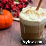 DIY Keto Low-Carb Starbucks Pumpkin Spice Latte Video Recipe 12 keto pumpkin spiced latte in a glass mug with whipped cream