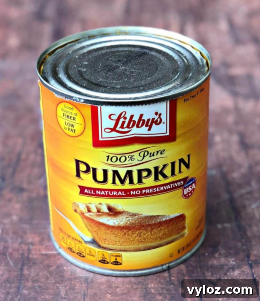 DIY Keto Low-Carb Starbucks Pumpkin Spice Latte Video Recipe 3 Can of 100% pure pumpkin on a rustic wooden surface