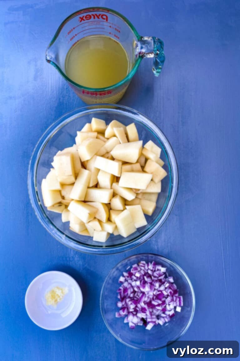 Loaded Instant Pot Baked Potato Soup 3 Sliced russet and red potato chunks in bowls, ready for Instant Pot potato soup