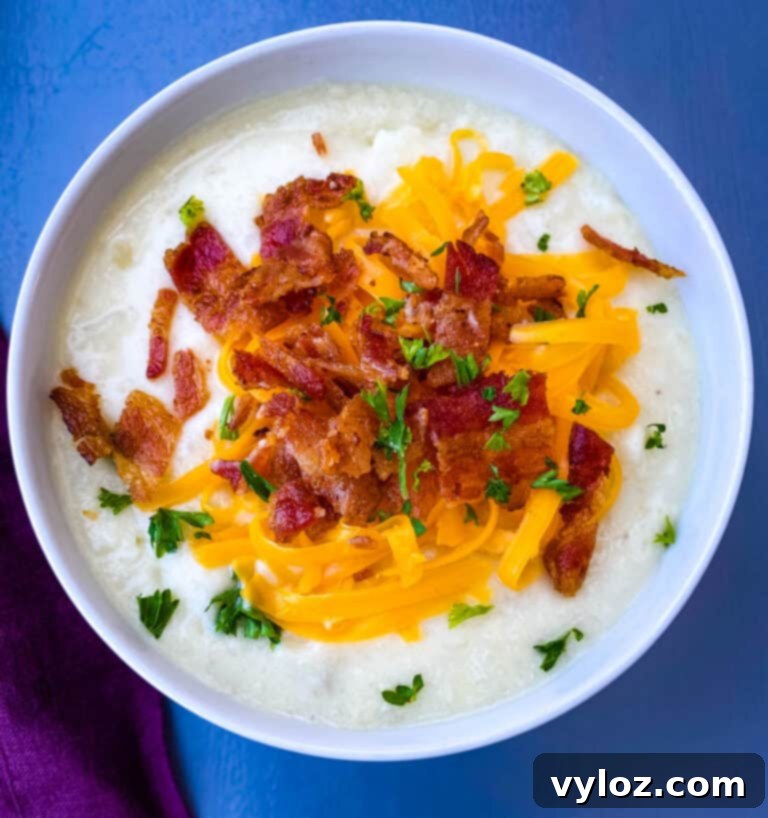 Loaded Instant Pot Baked Potato Soup 7 Three bowls of Instant Pot potato soup, loaded with bacon and cheese, ready to be served