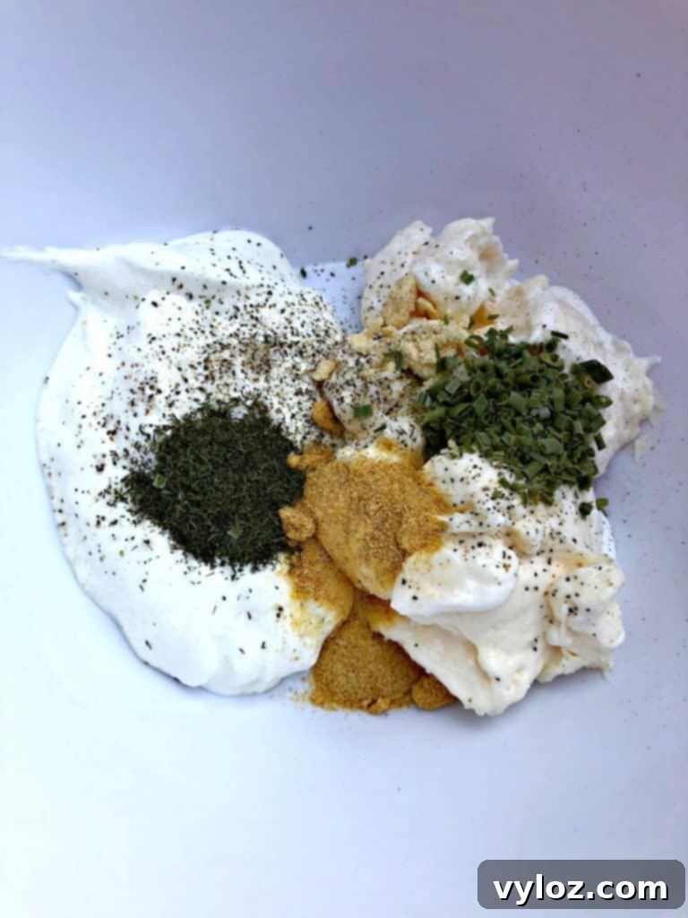 Creamy Sugar Free Ranch Dressing 3 low carb ranch dressing ingredients in a bowl