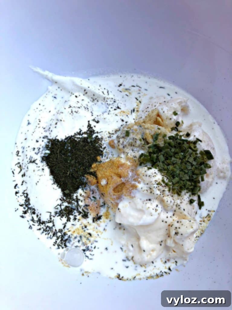 Creamy Sugar Free Ranch Dressing 4 low carb ranch dressing ingredients in a bowl