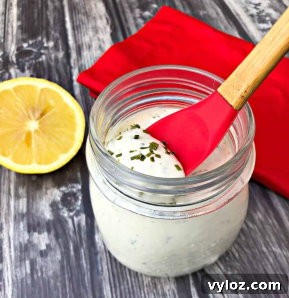 Creamy Sugar Free Ranch Dressing 6 keto low carb ranch dressing with a spoon with lemon