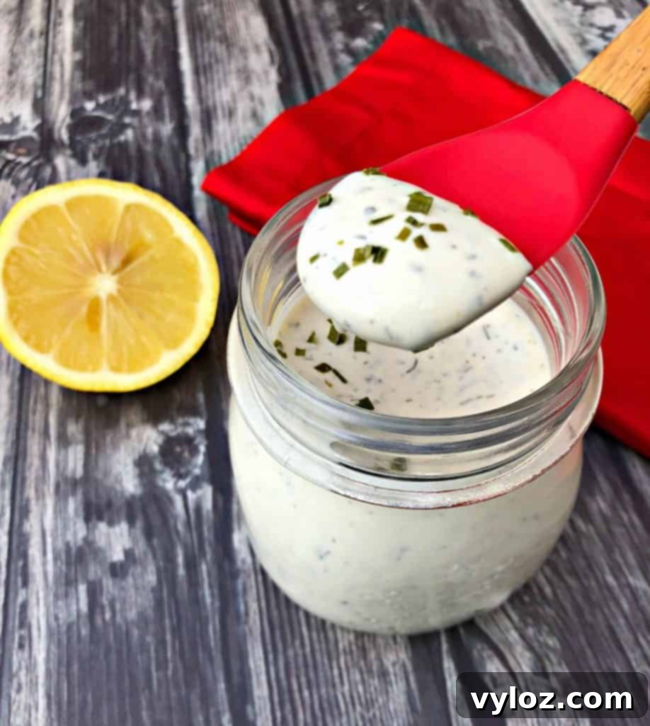 Creamy Sugar Free Ranch Dressing 7 keto low carb ranch dressing with a spoon with lemon