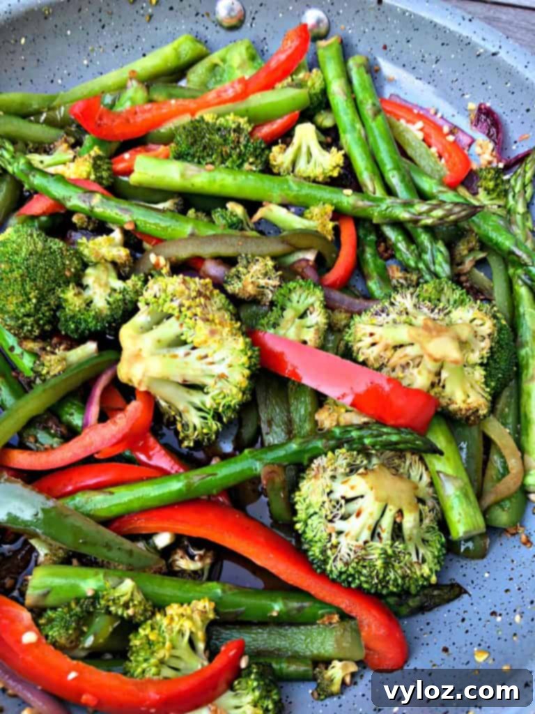 A beautifully presented bowl of low-carb vegetable stir fry, highlighting the fresh ingredients.