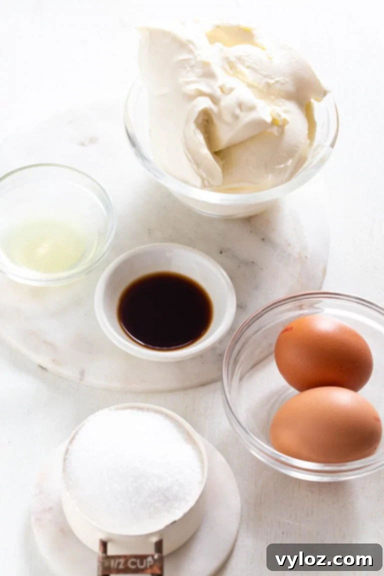 A springform pan with a pre-baked almond flour cheesecake crust, ready for the filling.