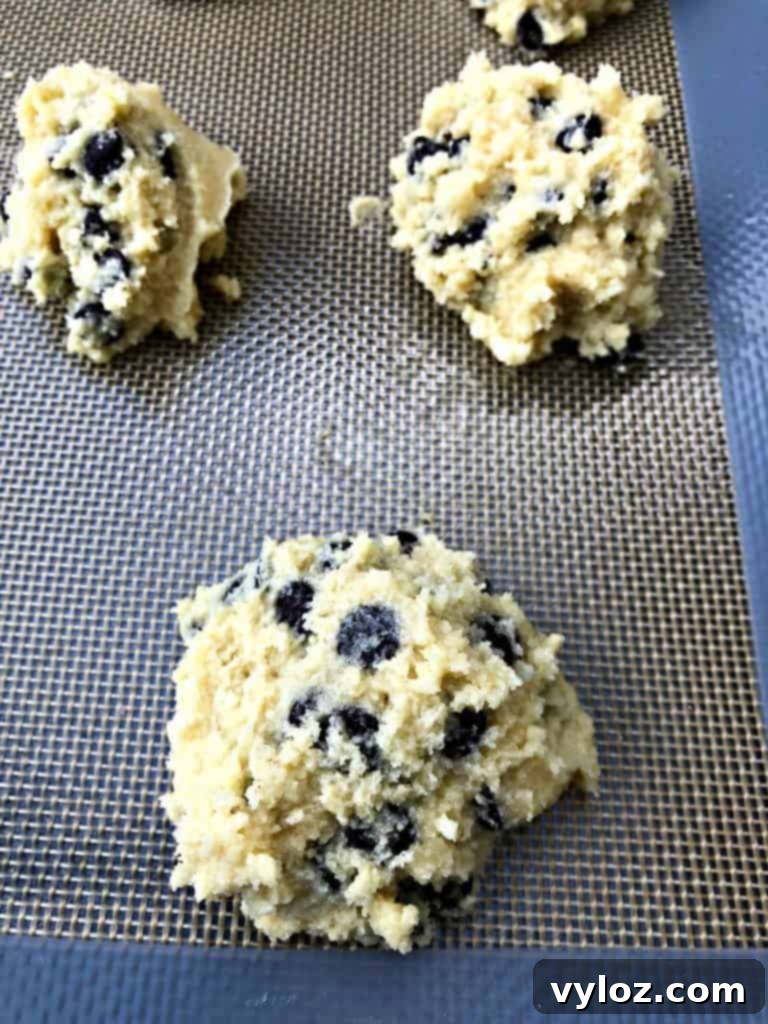 keto chocolate chip cookies on a cookie sheet