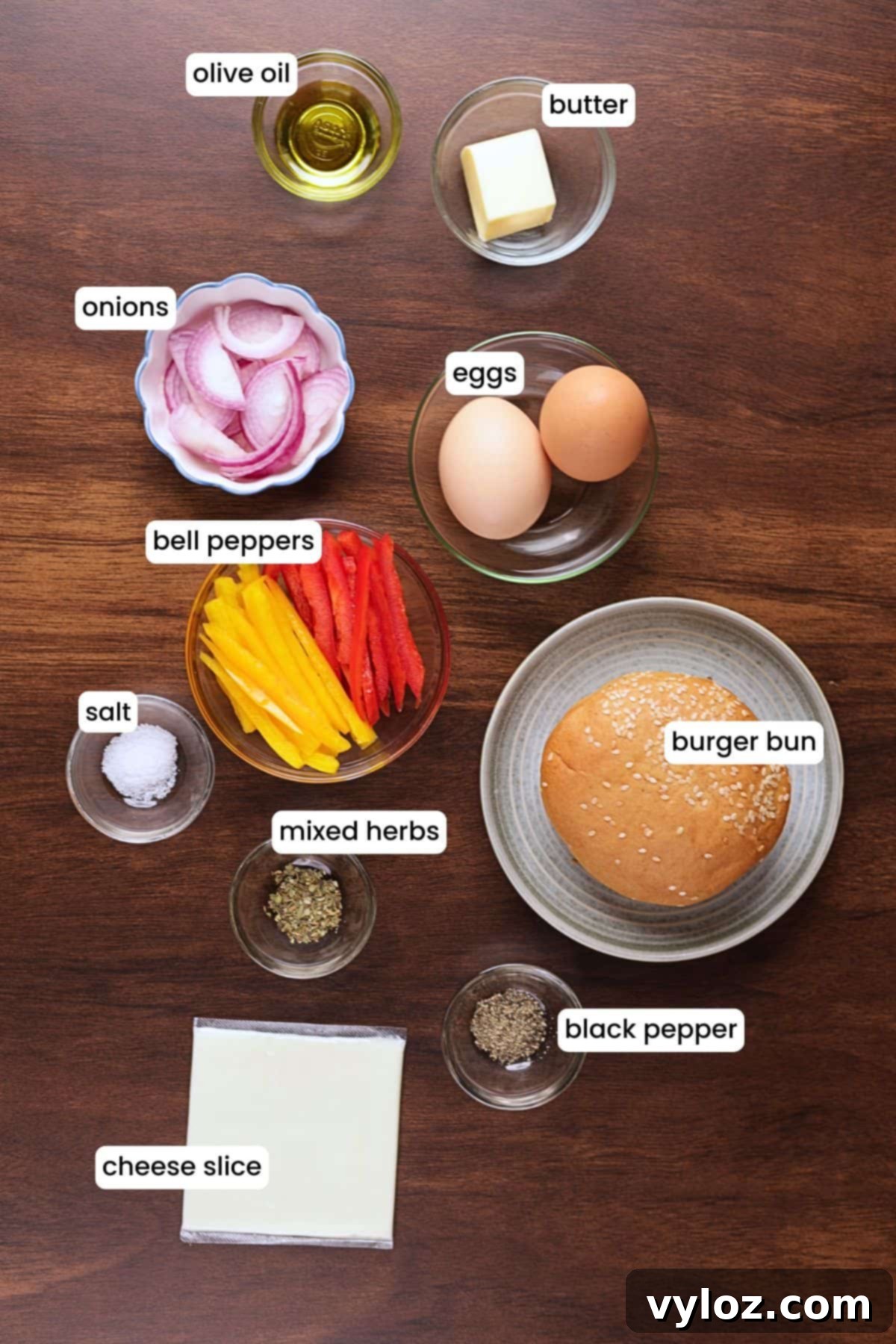 Speedy Pepper & Egg Sandwich: Ready in a Flash! 3 Ingredients for Pepper and Egg Sandwich including eggs, bell peppers, onion, cheese, bread, butter, and seasonings.